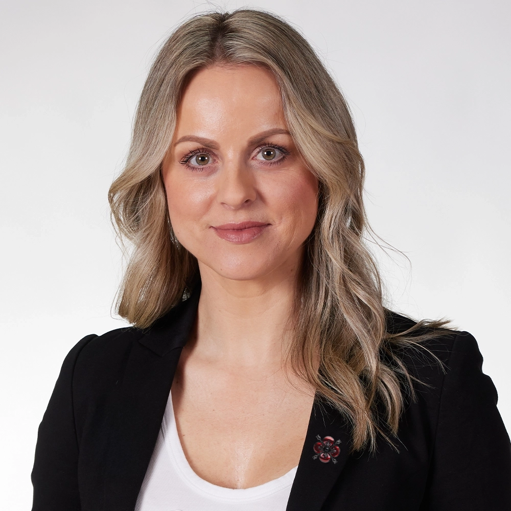 Model wearing Black Obsidian Poppy Brooch